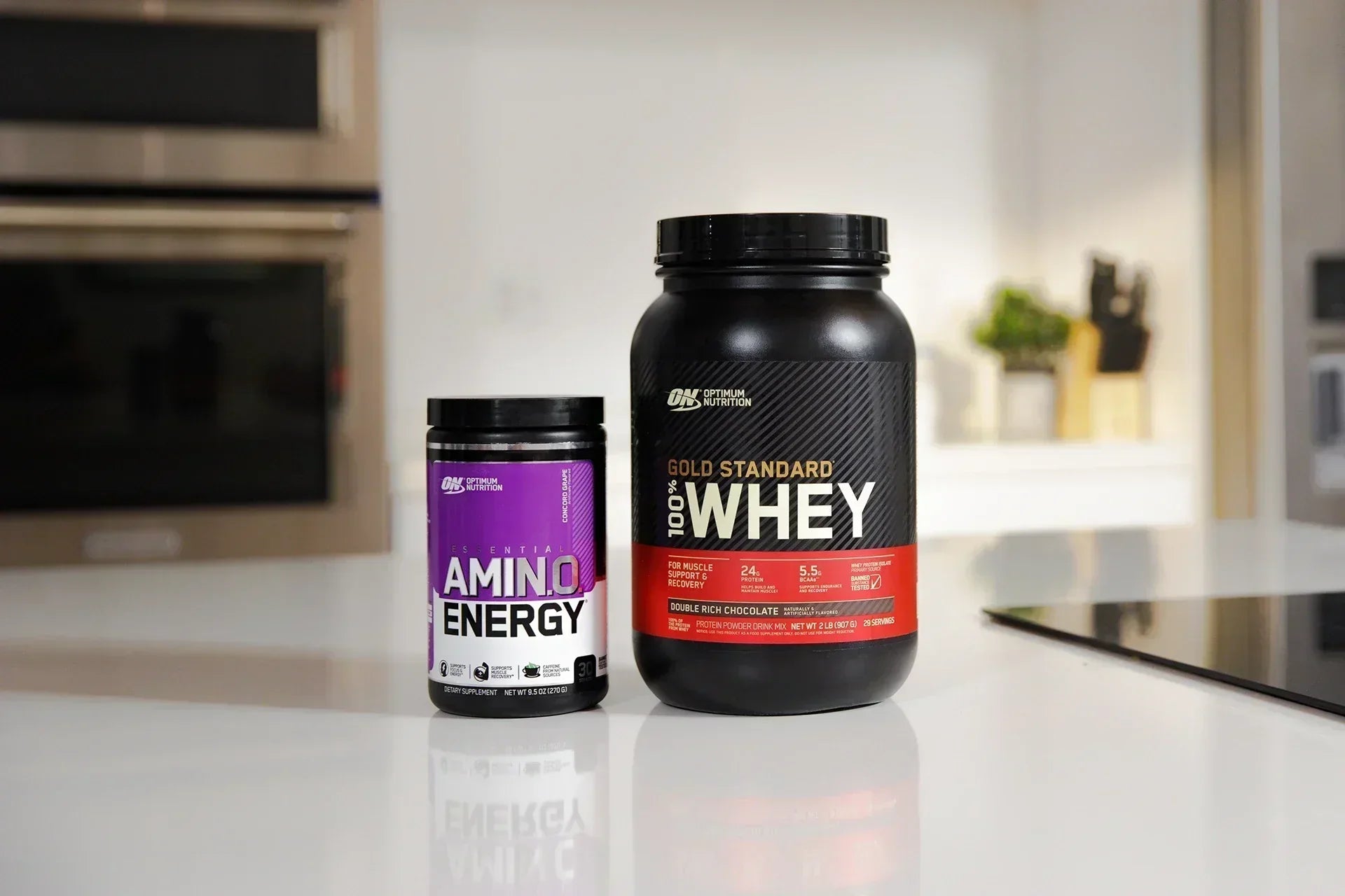 Optimum Nutrition Gold Standard 100% Whey and Amino Energy - Sitting on bench