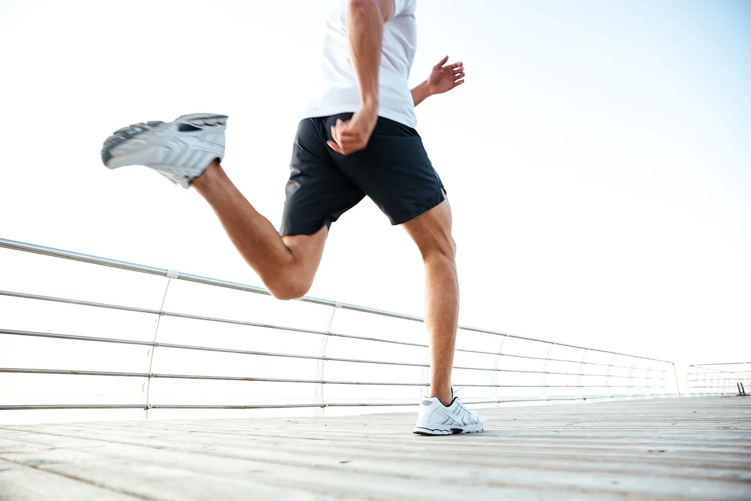 Male Athlete Running - Lower Body Shot