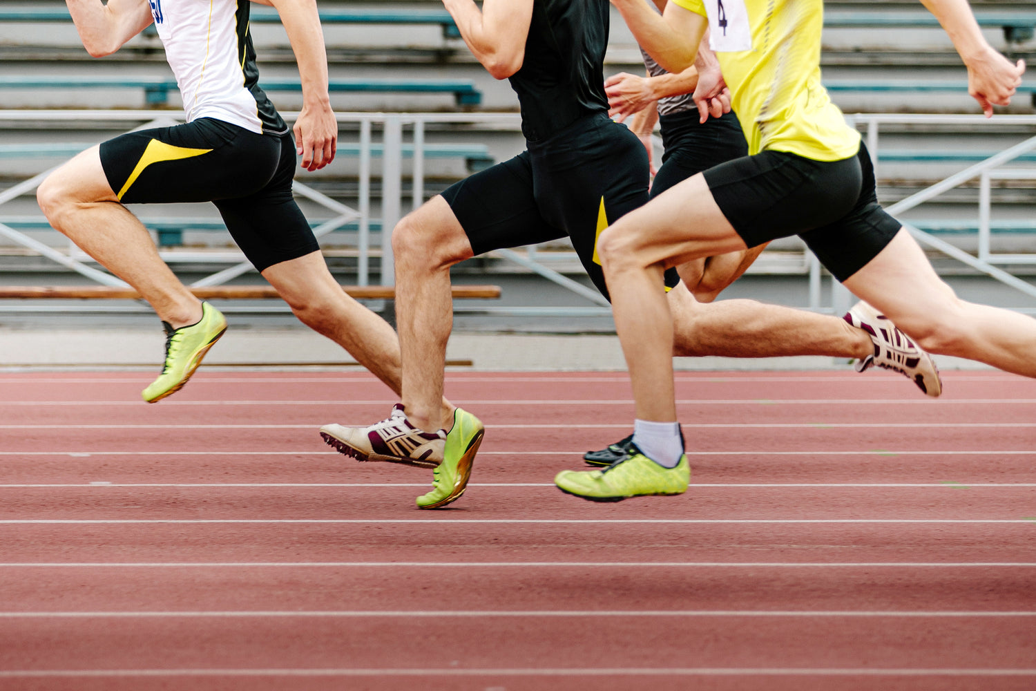 Men running track