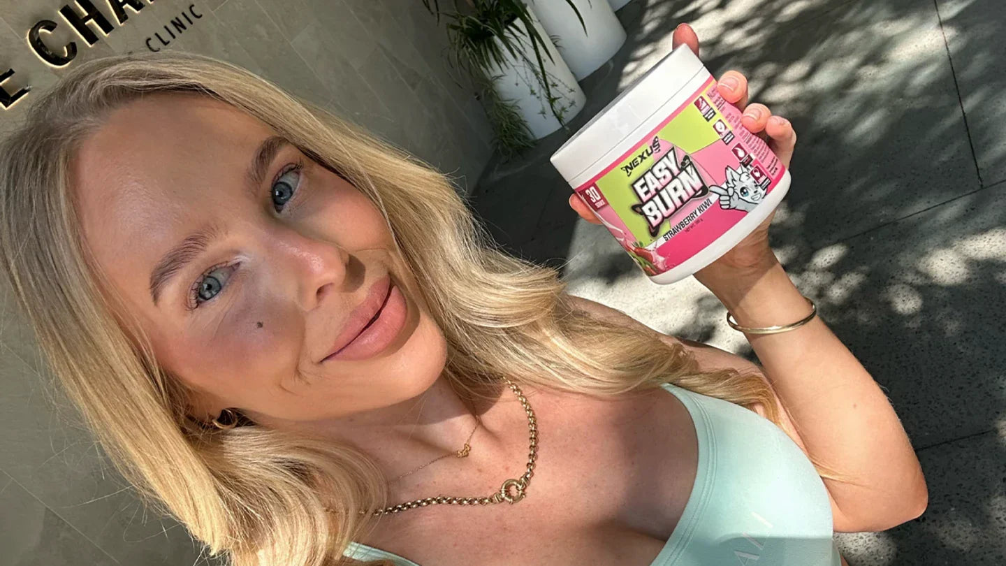 Female Athlete holding Nexus Easy Burn