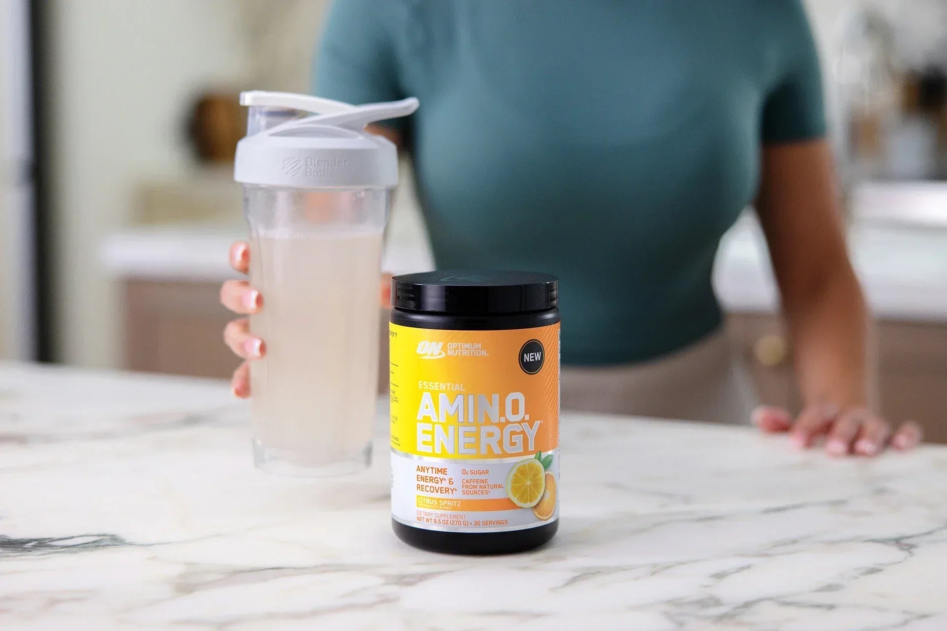 ON Amino Energy - Citrus Spritz, Woman Drinking