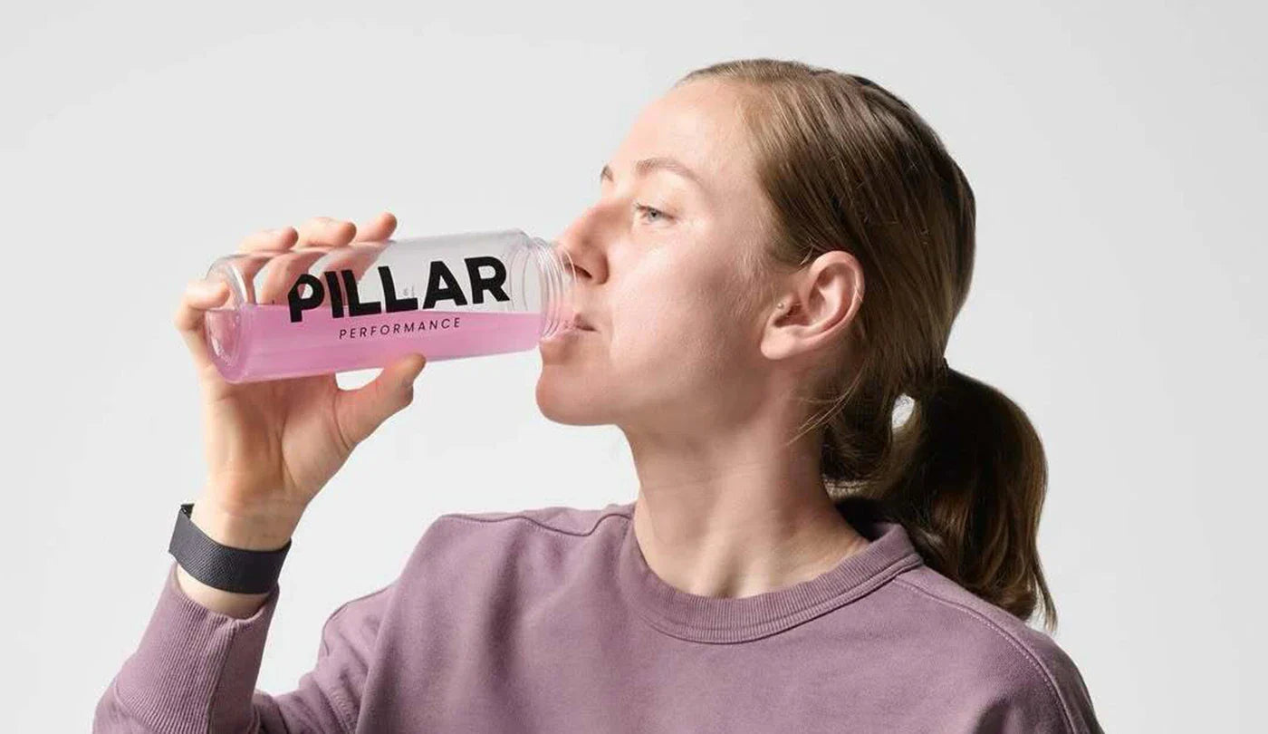 Pillar Performance Athlete Sipping on Triple Magnesium Powder
