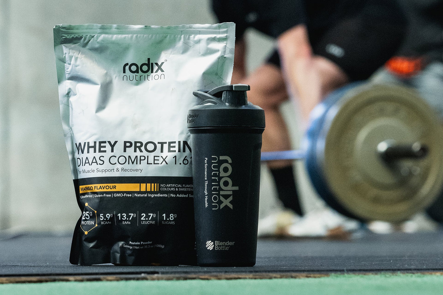 Radix Nutrition Whey Protein and Shaker at the Gym