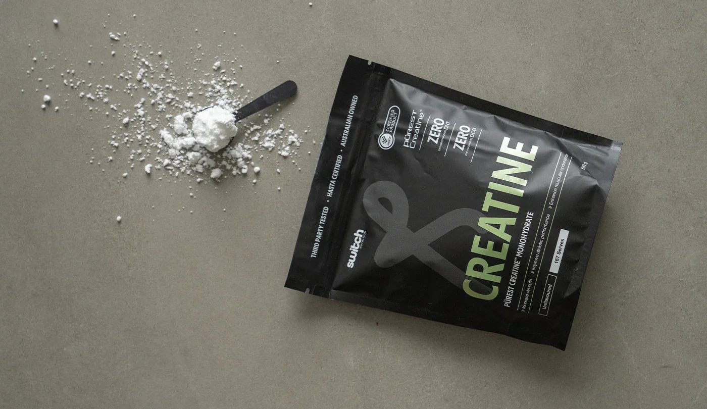 Switch Perform Purest Creatine Monohydrate - Flat-lay image with scoop