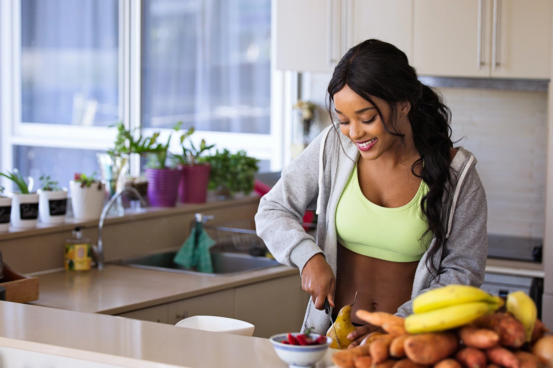 Woman Cutting Fruit