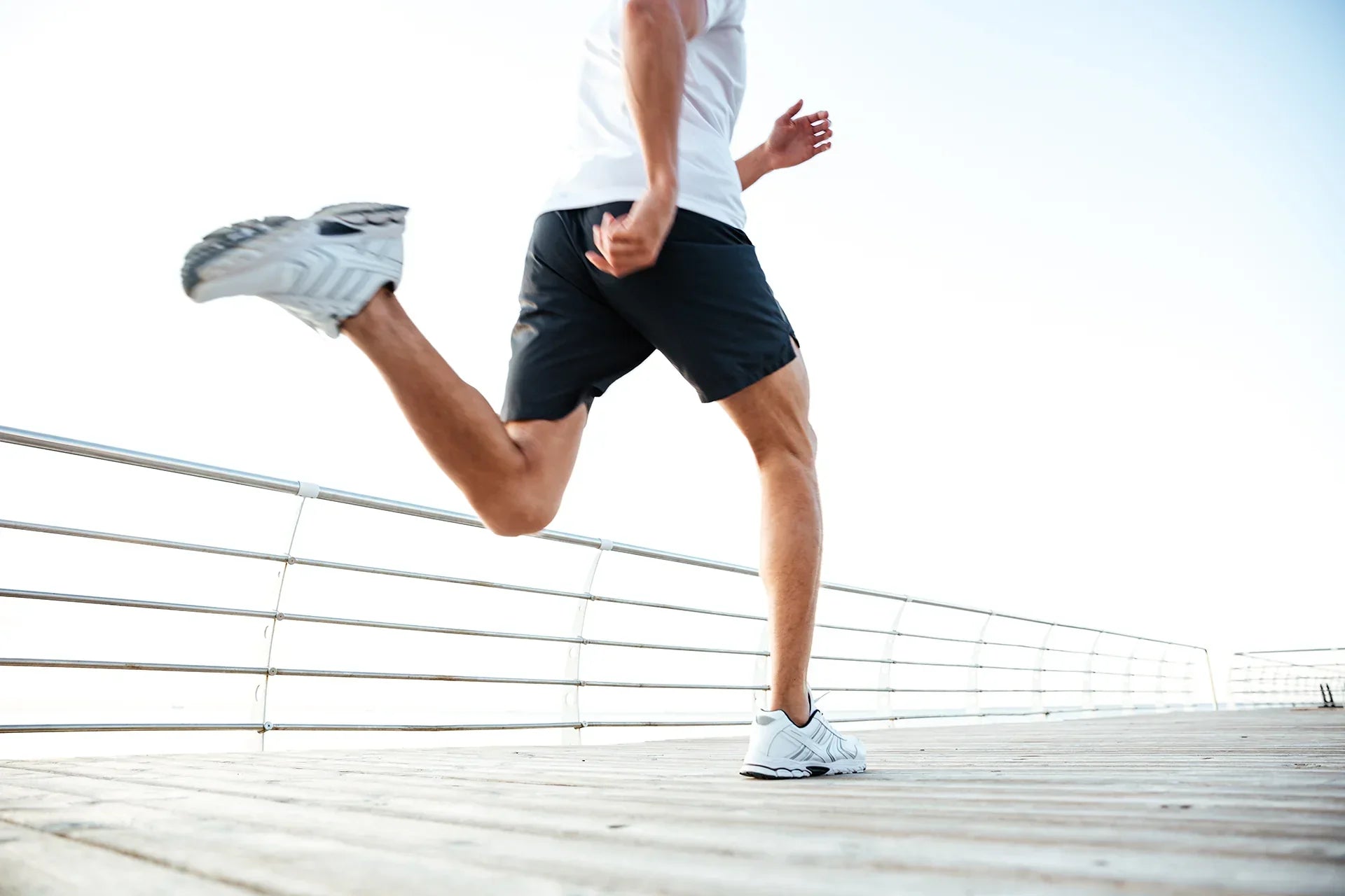 Male Athlete Running - Lower Body Shot